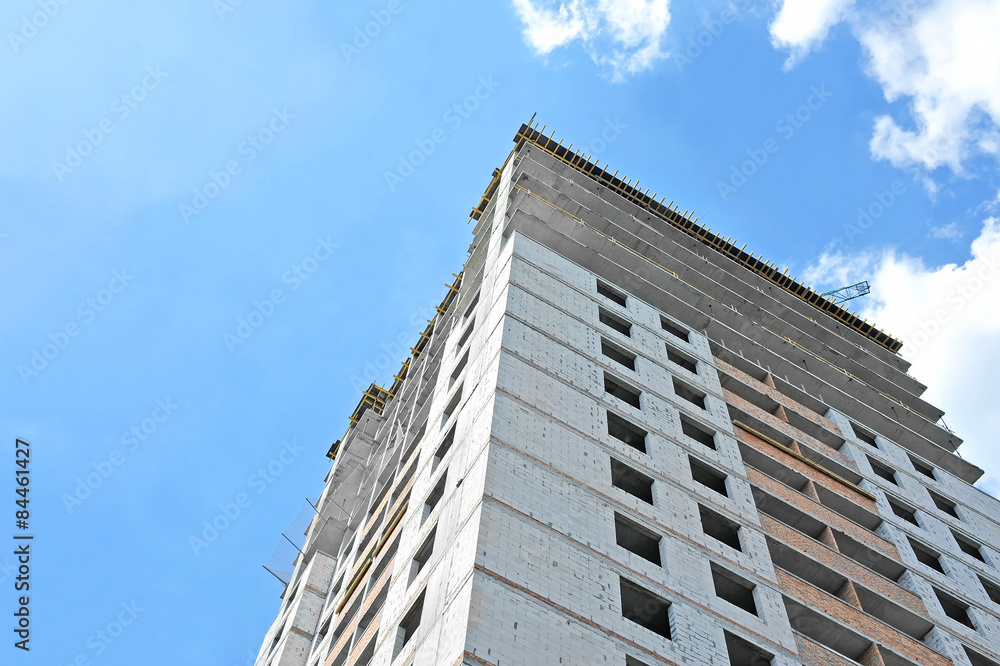 Building construction site work against blue sky Building construction site work against blue sky
