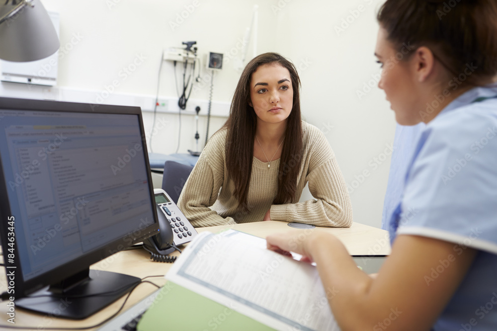 Nurse Discussing Test Results With Patient Nurse Discussing Test Results With Patient