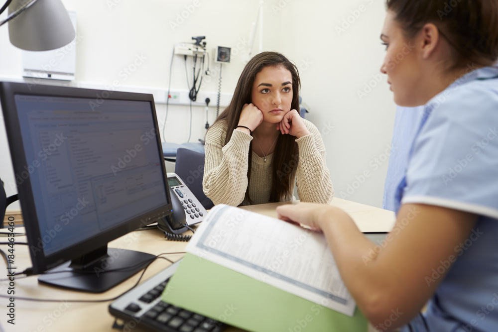 Nurse Discussing Test Results With Patient Nurse Discussing Test Results With Patient