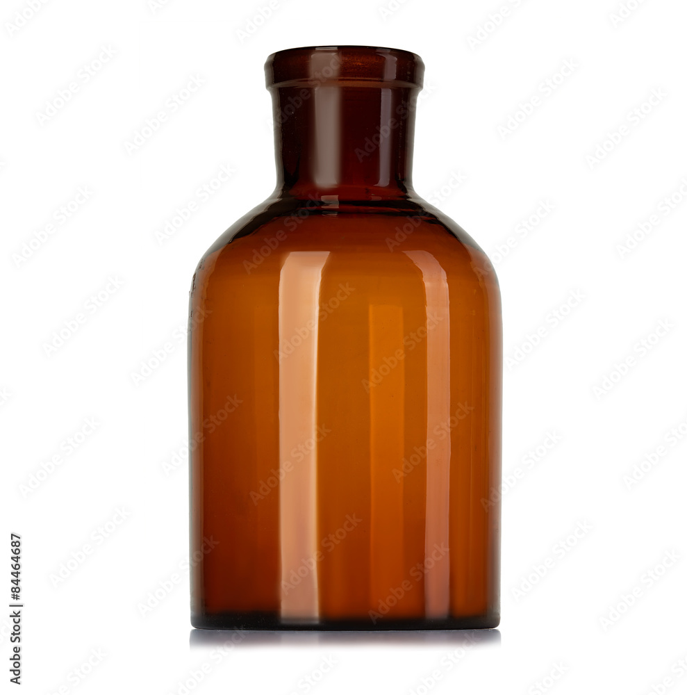 Old pharmacy bottle for medicines isolated on white background