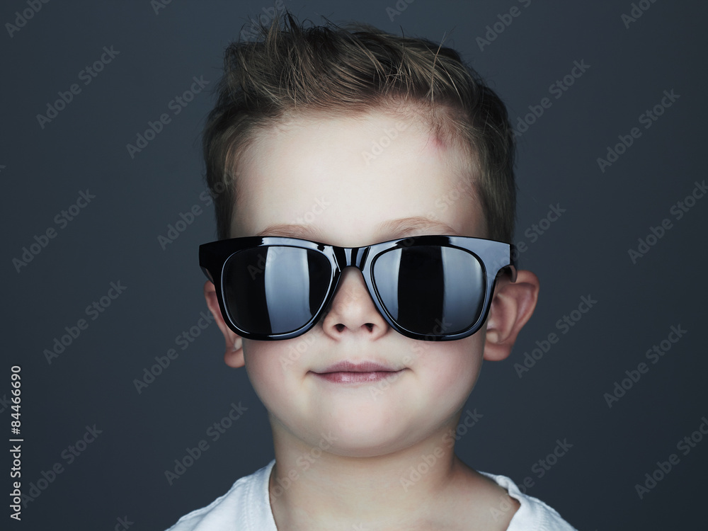 Funny child.fashionable little boy in sunglasses