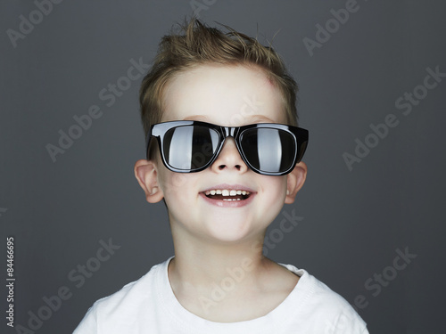 Funny child.fashionable little boy in sunglasses