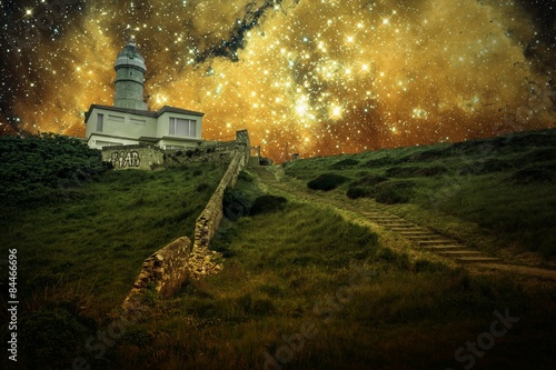 Lighthouse and small Magellanic Cloud (Elements of this image fu photo