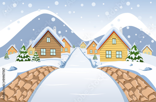 The view from the small stone bridge at the day snowy village