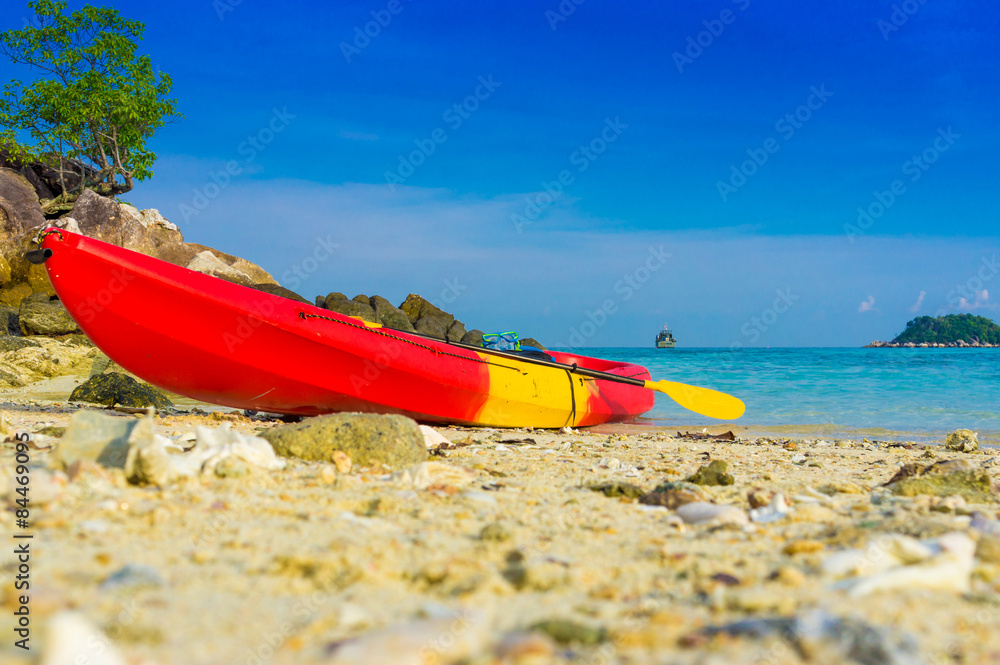 Red yellow kayaks on the tropical beach, Lipe island Red yellow kayaks on the tropical beach, Lipe island