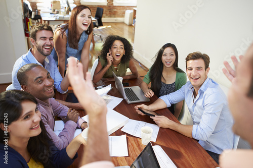 Group Of Office Workers Meeting To Discuss Ideas
