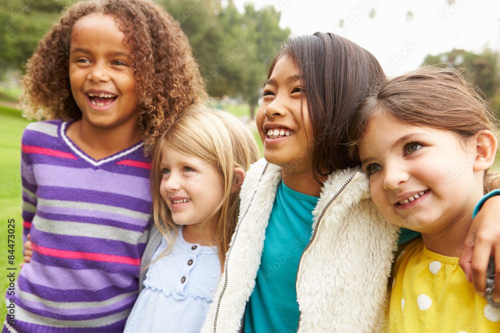 Group Of Young Girls Hanging Out In Park Together Group Of Young Girls Hanging Out In Park Together