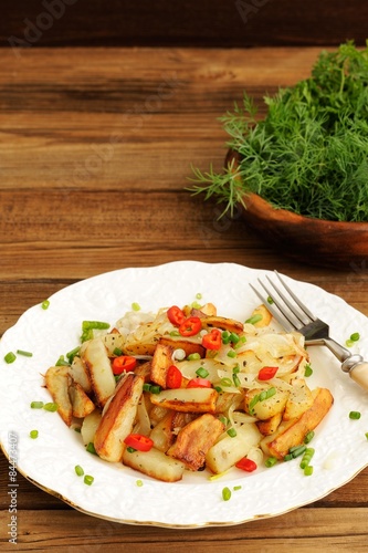 Wallpaper Mural Fried potatoes with scallion and chili in white plate with fork Torontodigital.ca