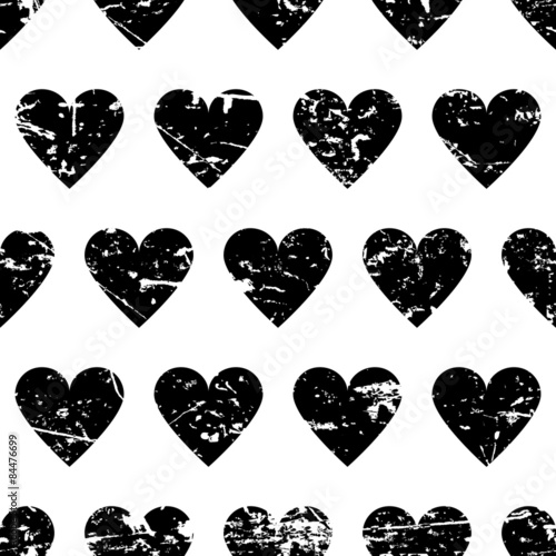 Hand drawn vector seamless pattern with black hearts isolated on