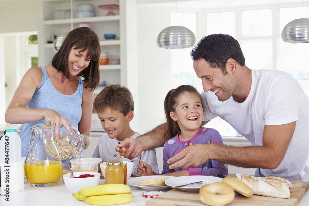 Family Making Breakfast In Kitchen Together Family Making Breakfast In Kitchen Together