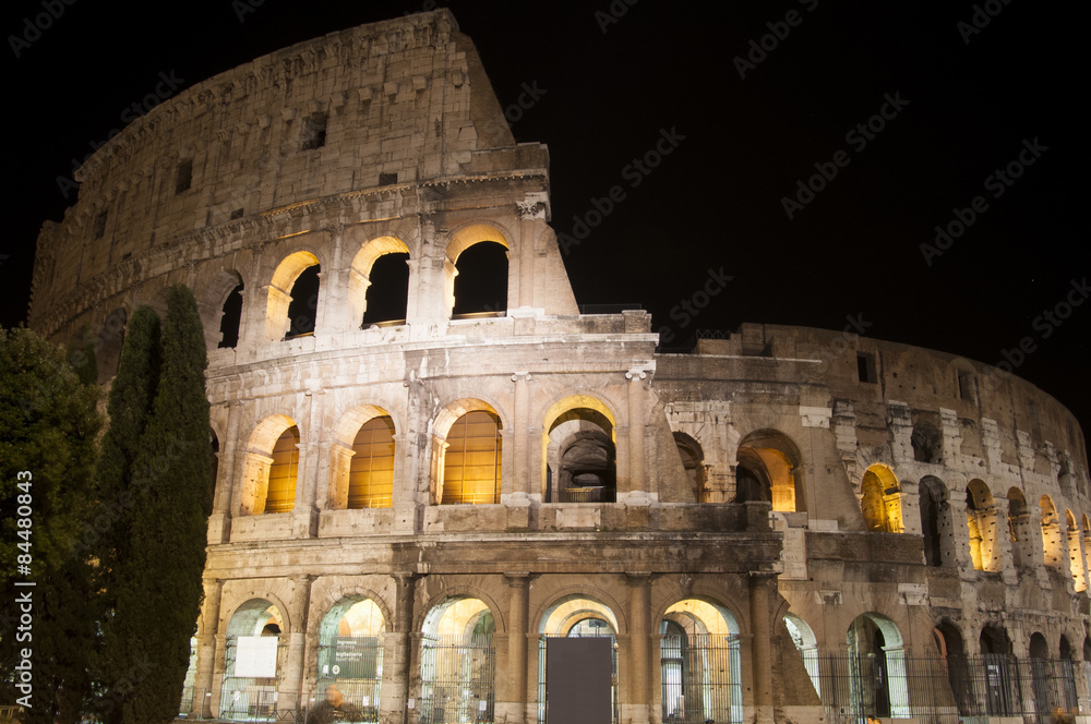 Roman Coliseum at night in Rome, Italy