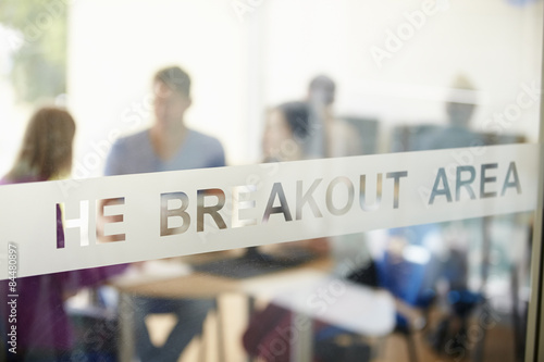 Mature Students Working In College Breakout Area