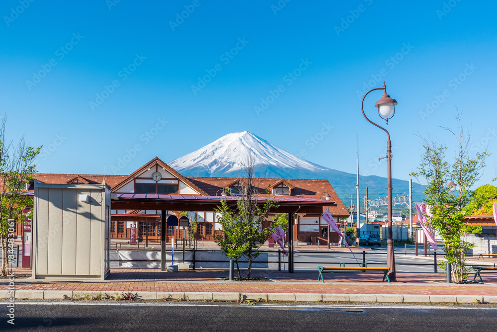 Fototapeta premium kawaguchiko bus stop with Mount Fuji behide Kawaguchiko station