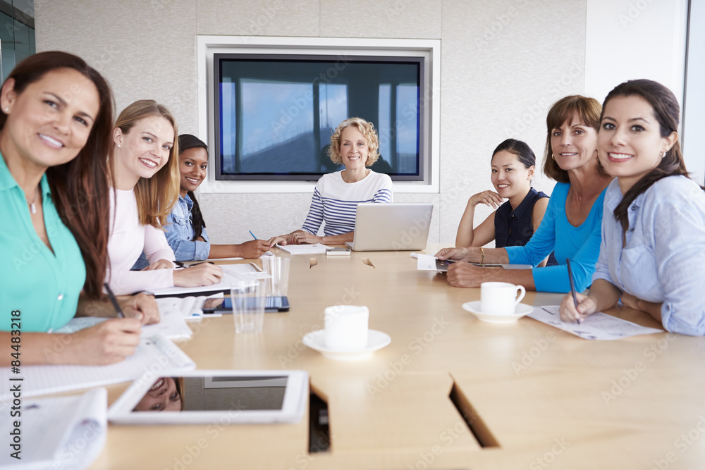 Group Of Businesswomen Meeting Around Boardroom Table Group Of Businesswomen Meeting Around Boardroom Table