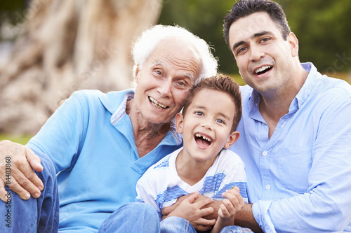 Grandfather With Grandson And Father In Park