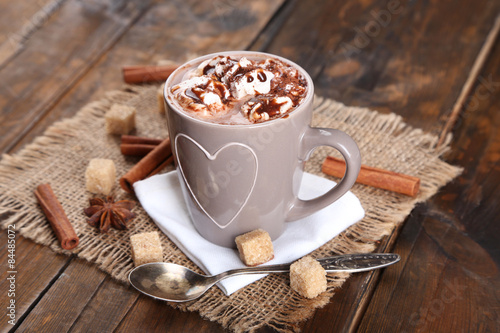 Εκτύπωση καμβά Cup of hot coffee with marshmallow on burlap cloth with lump sugar, sticks of ci