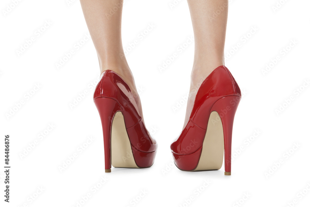 attraktive weibliche Beine mit roten Stilettos High Heels als Na attraktive weibliche Beine mit roten Stilettos High Heels als Na