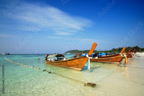 Thai Longtail Boat onthe beach © happysunstock