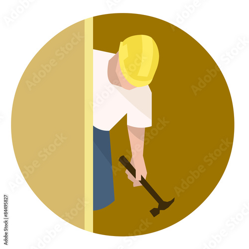 Builder or carpenter with hammer doing house renovation