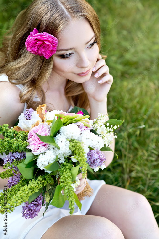 Fototapeta premium Beautiful bride in the garden. Soft focus. 