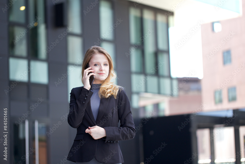 Young businesswoman talking to mobile Young businesswoman talking to mobile