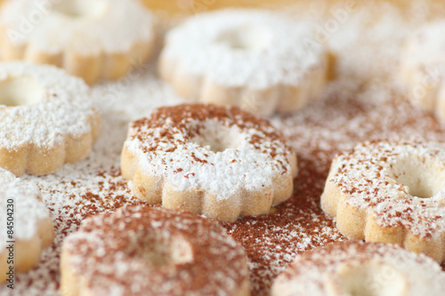 Italian canestrelli biscuits with both powdered sugar and cocoa power