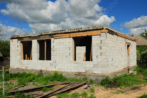 House construction site with blue cloudy sky  © bildlove