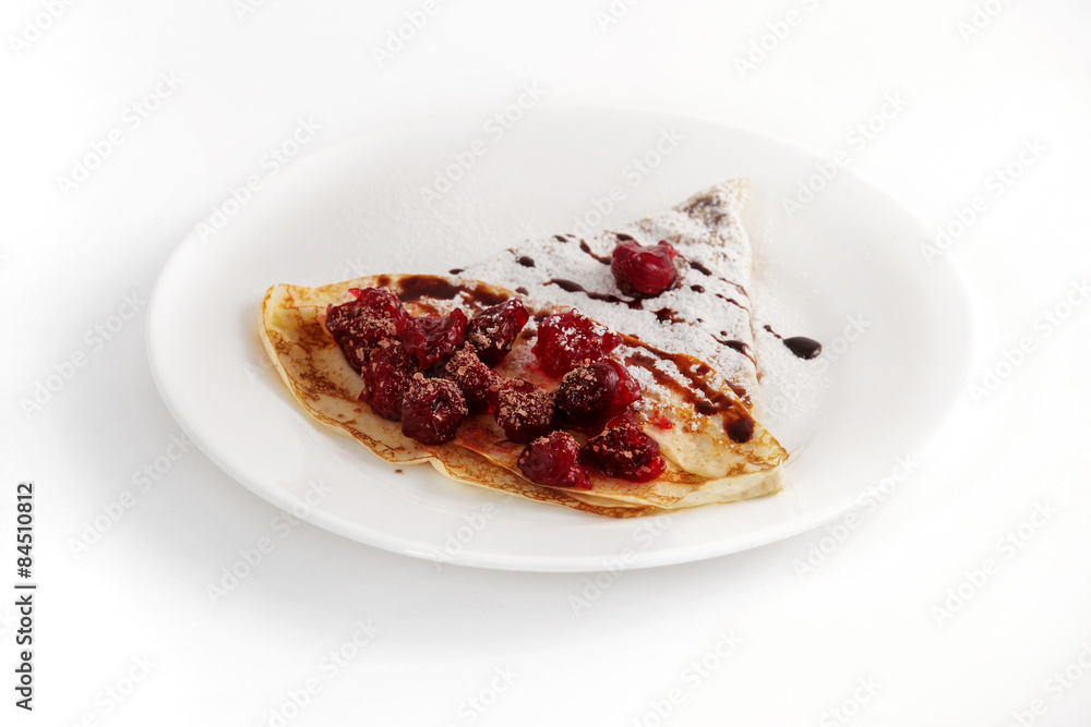 fresh fried pancake plate decorated with sweet cherry fresh fried pancake plate decorated with sweet cherry