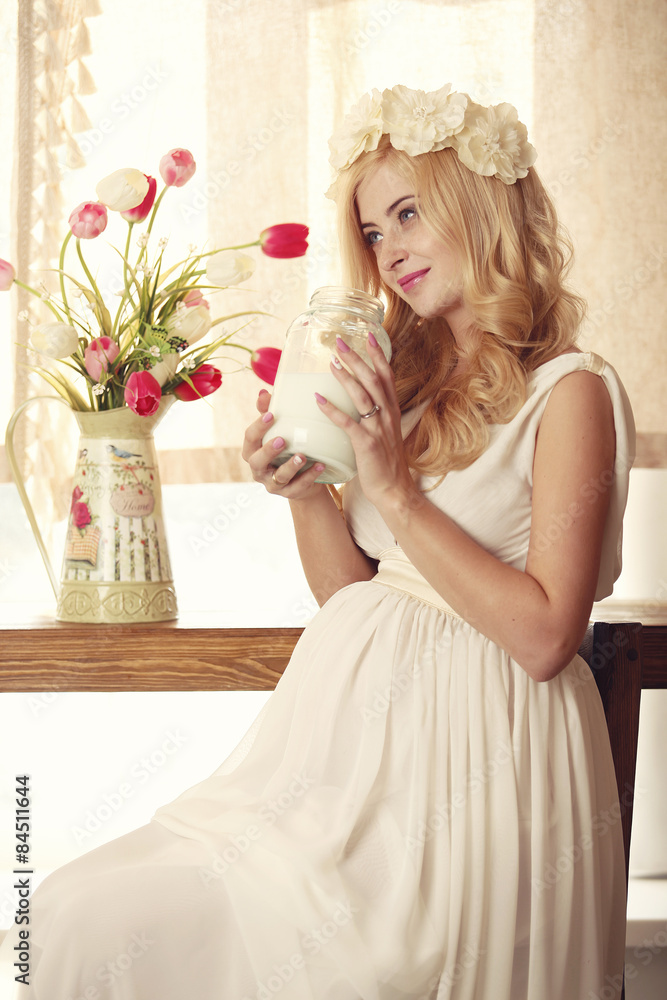 Model, woman, blonde, pregnant in the interior Model, woman, blonde, pregnant in the interior