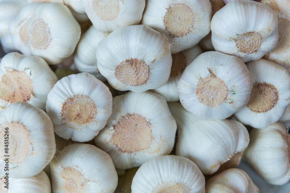 several garlic lumps lying at market for sale