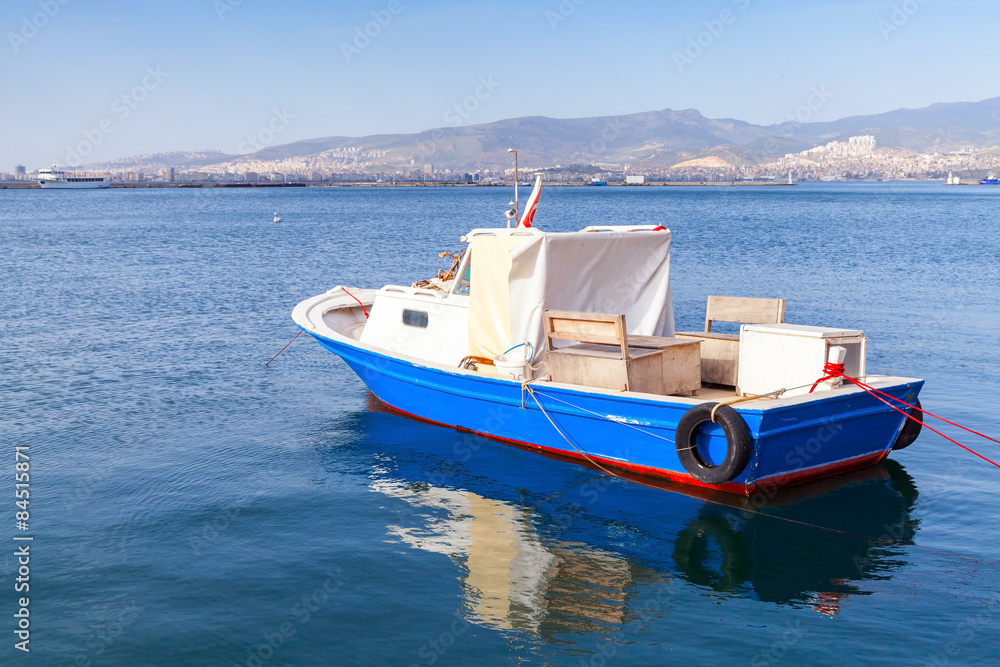 Old wooden pleasure boat anchored in Izmir
