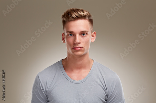 Portrait of stern looking male teenager