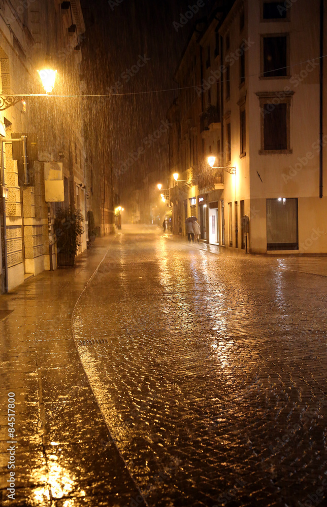 European city during one night with the storm and the rain