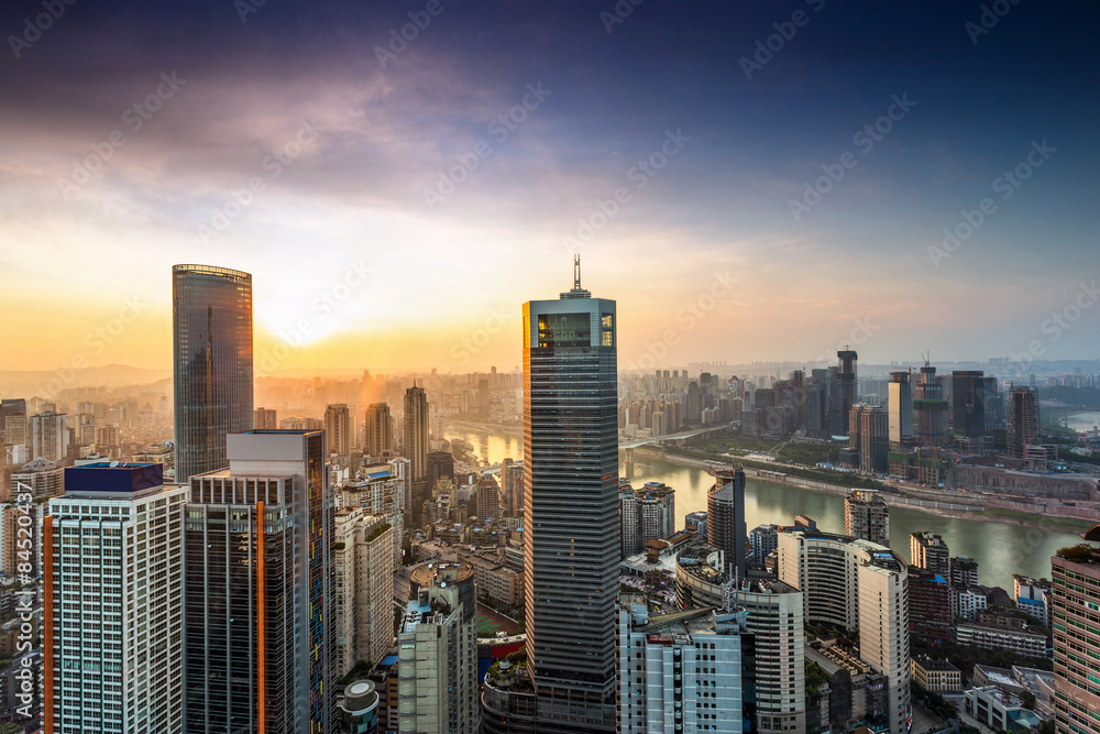 High angle view of modern skyline during sunset