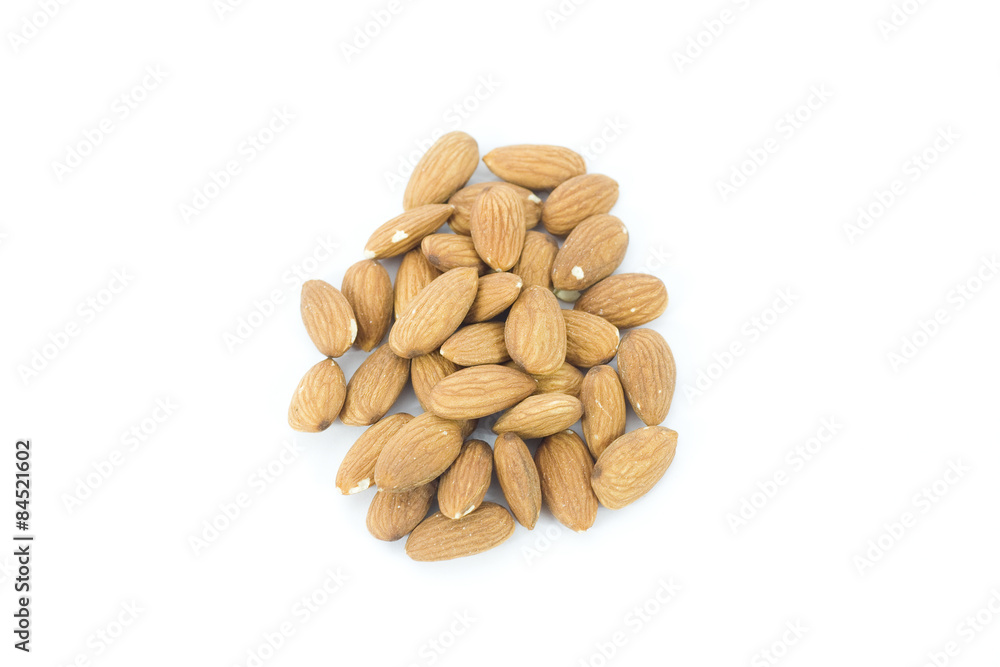 Sweet almonds in a pile and isolated on a white background Sweet almonds in a pile and isolated on a white background