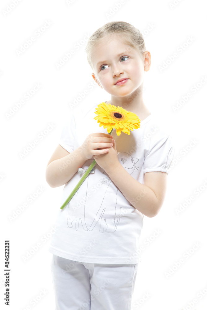 Beautiful girl holding yellow flowers
