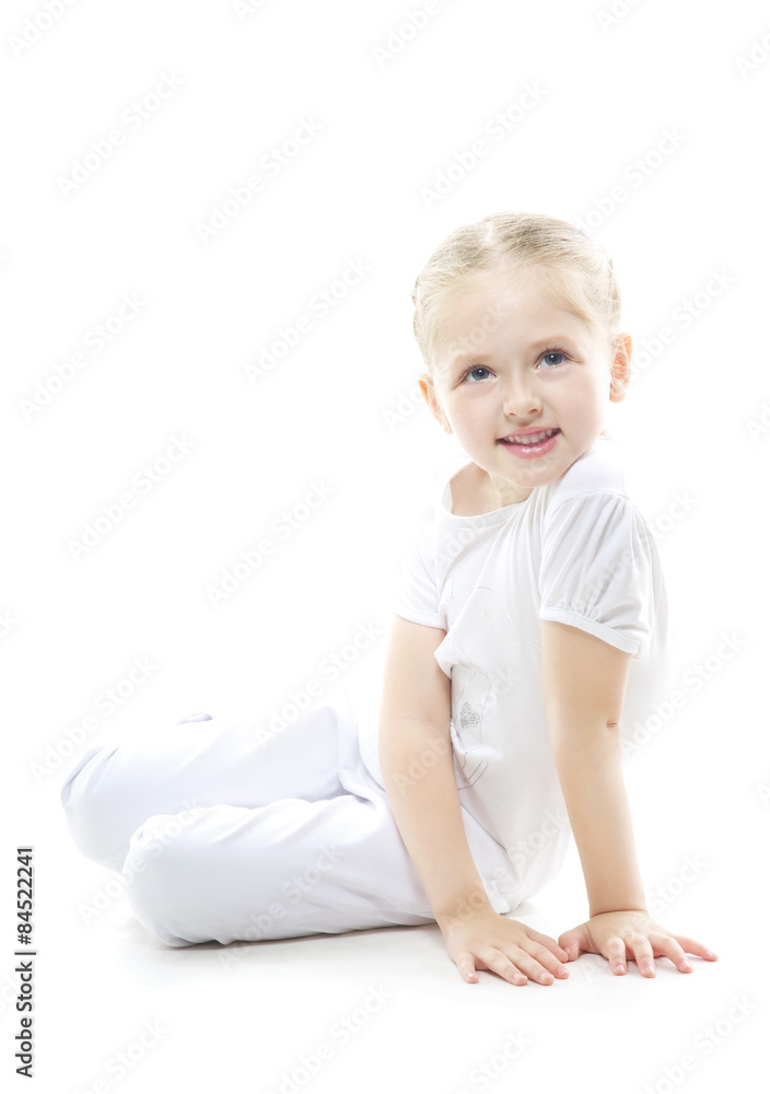 beautiful sweet girl sitting on the floor in white beautiful sweet girl sitting on the floor in white