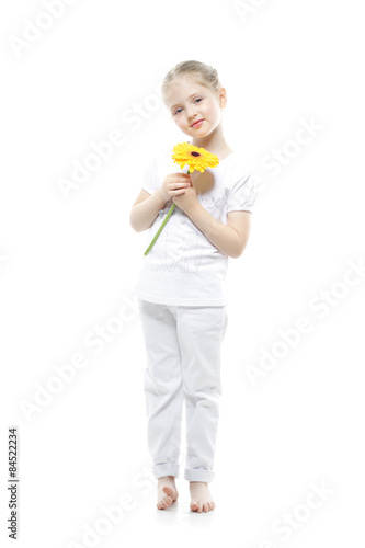 Beautiful girl holding yellow flowers