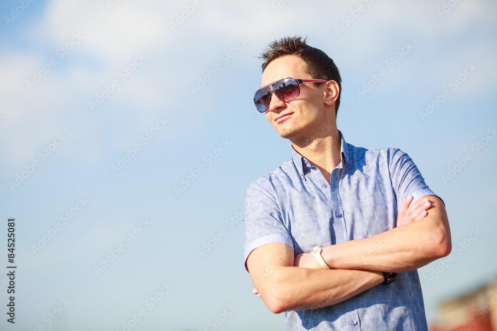portrait of a trendy young man in the city portrait of a trendy young man in the city