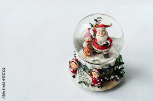 Obraz na płótnie Snow globe with Santa Claus inside w salonie