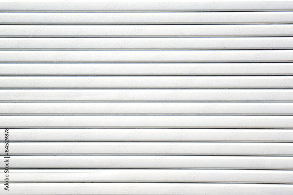 Close up white metal sheet slide door texture background. Close up white metal sheet slide door texture background.
