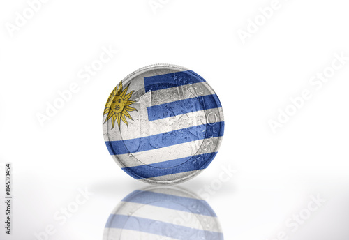 euro coin with uruguayan flag on the white background