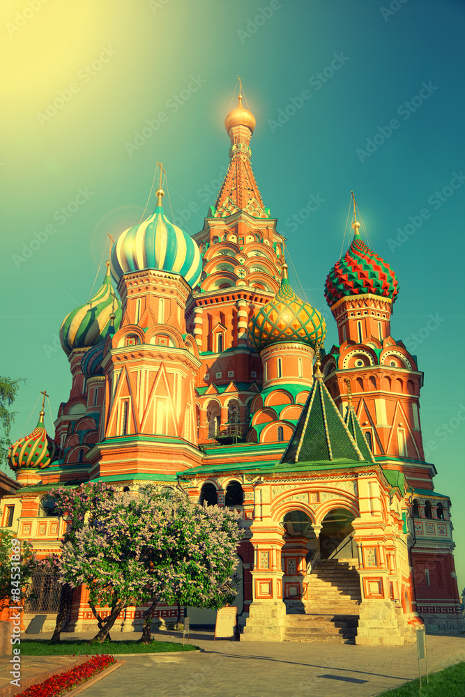Domes of St. Basil's Cathedral in Moscow's Red Square in Russia in sunny summer weather. Vintage style