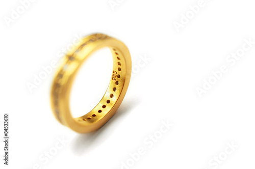 Golden Ring isolated on white background. Selective focus.