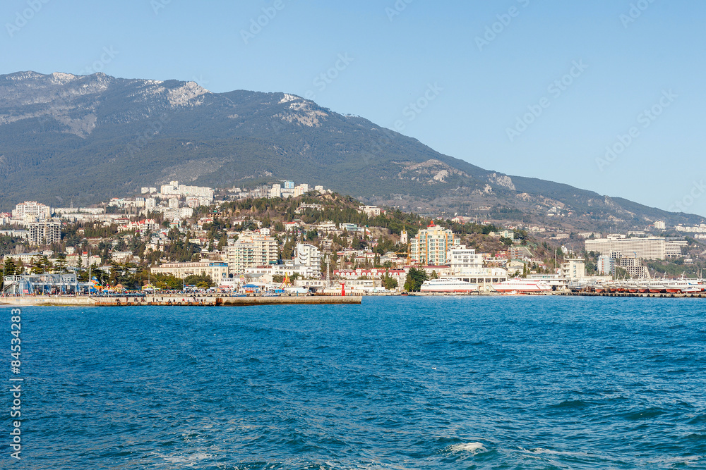 Beautiful view on embankment of Yalta. Sunny day. 