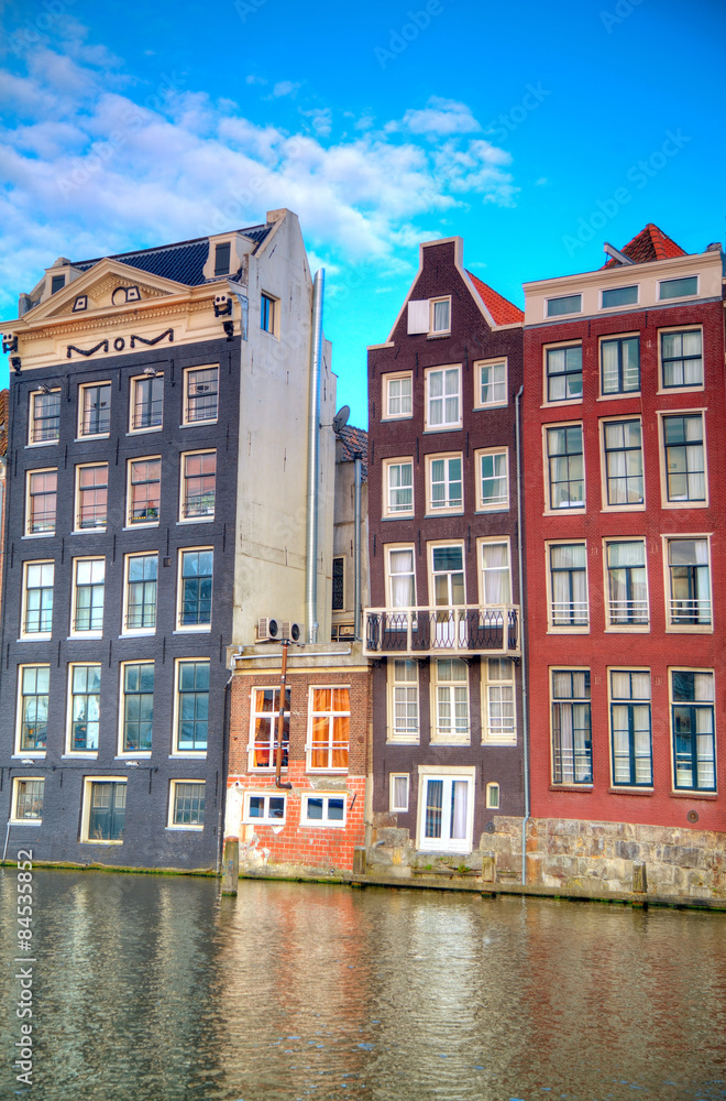Traditional dutch buildings . canal in Amsterdam
