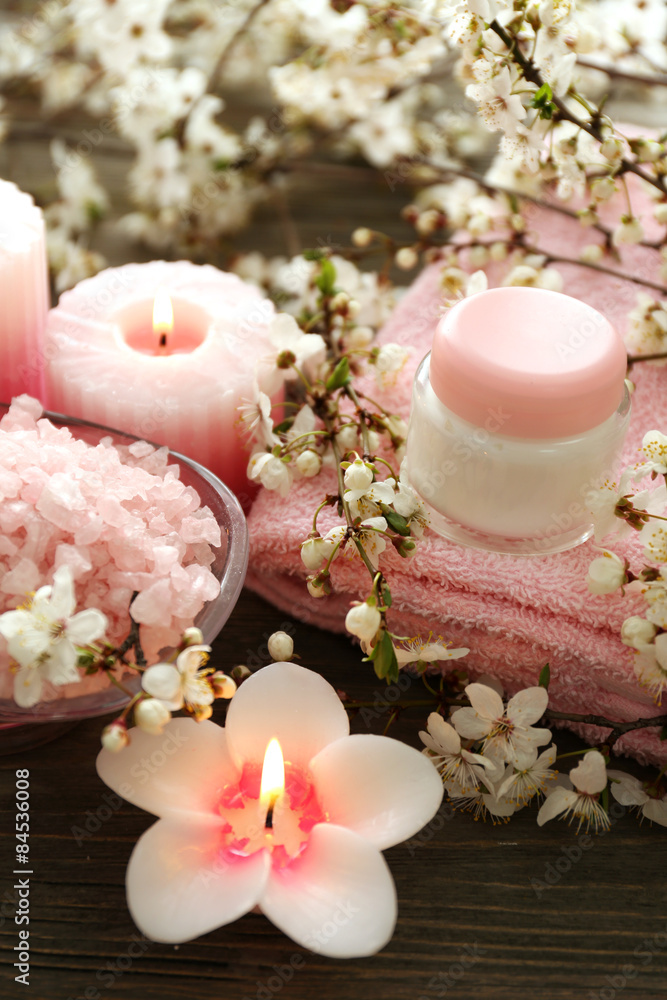 Spa still life with flowering branches on wooden table, closeup Spa still life with flowering branches on wooden table, closeup
