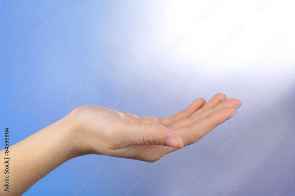 Female hand on colorful background Female hand on colorful background