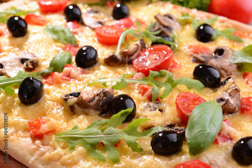 Delicious homemade pizza on table close-up