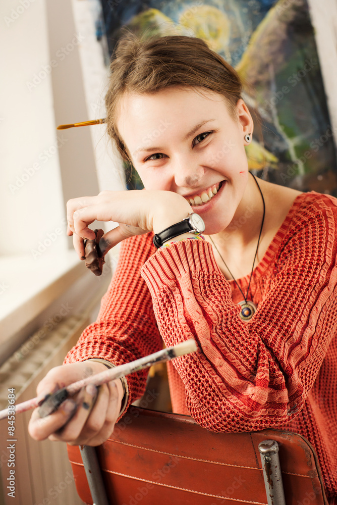Portrait of beautiful woman artist with positive emotion Portrait of beautiful woman artist with positive emotion